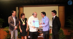 Fr. Joel S. Tabora, together with several International Studies instructors, presents Hon. Charles C. Jose  with a certificate of appreciation for his presence in the event. Photo contributed by Mark Jenrie Ompoy of the Ateneo Photographers' Society.