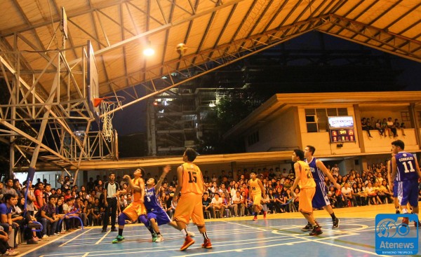 Players form the BSA Griffins and the BM Vipers fight for the rebound in the second game of the men's basketball tournament. Photo by Raymond Trespeces