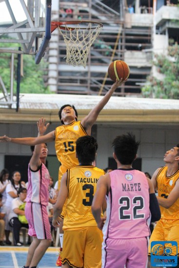  An Accountancy player rises up for the hoop. Photo by Camaela Mijares