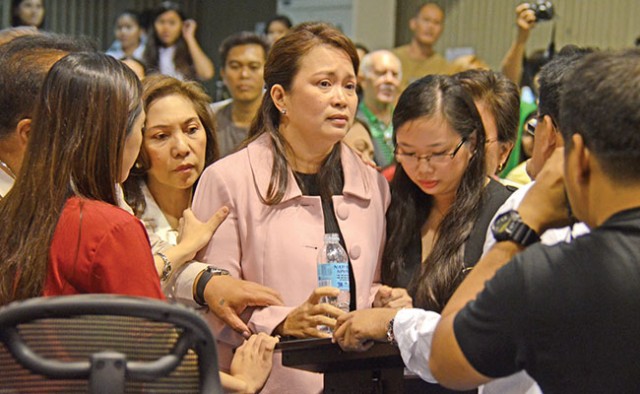 Suppressed anger and tears is on the face of Davao City Councilor Maria Belen Acosta while Councilor Joselle Villafuerte tries to console her after Councilor Diosdado Angelo Mahipus Sr. called her “spoiled brat” with regards the issue of the 10% green space on subdivision developments that was scrapped by the City Council, but was vetoed by Davao City Mayor Rodrigo R. Duterte. Photo and caption by Darryl Postrano/Sun.Star Davao