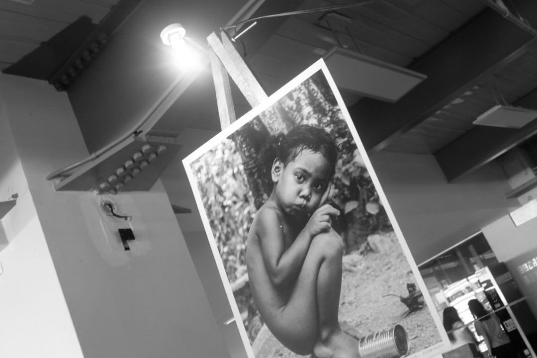 A photo from the exhibit featuring an impoverished child. Photo by Ian Derf Salvaña