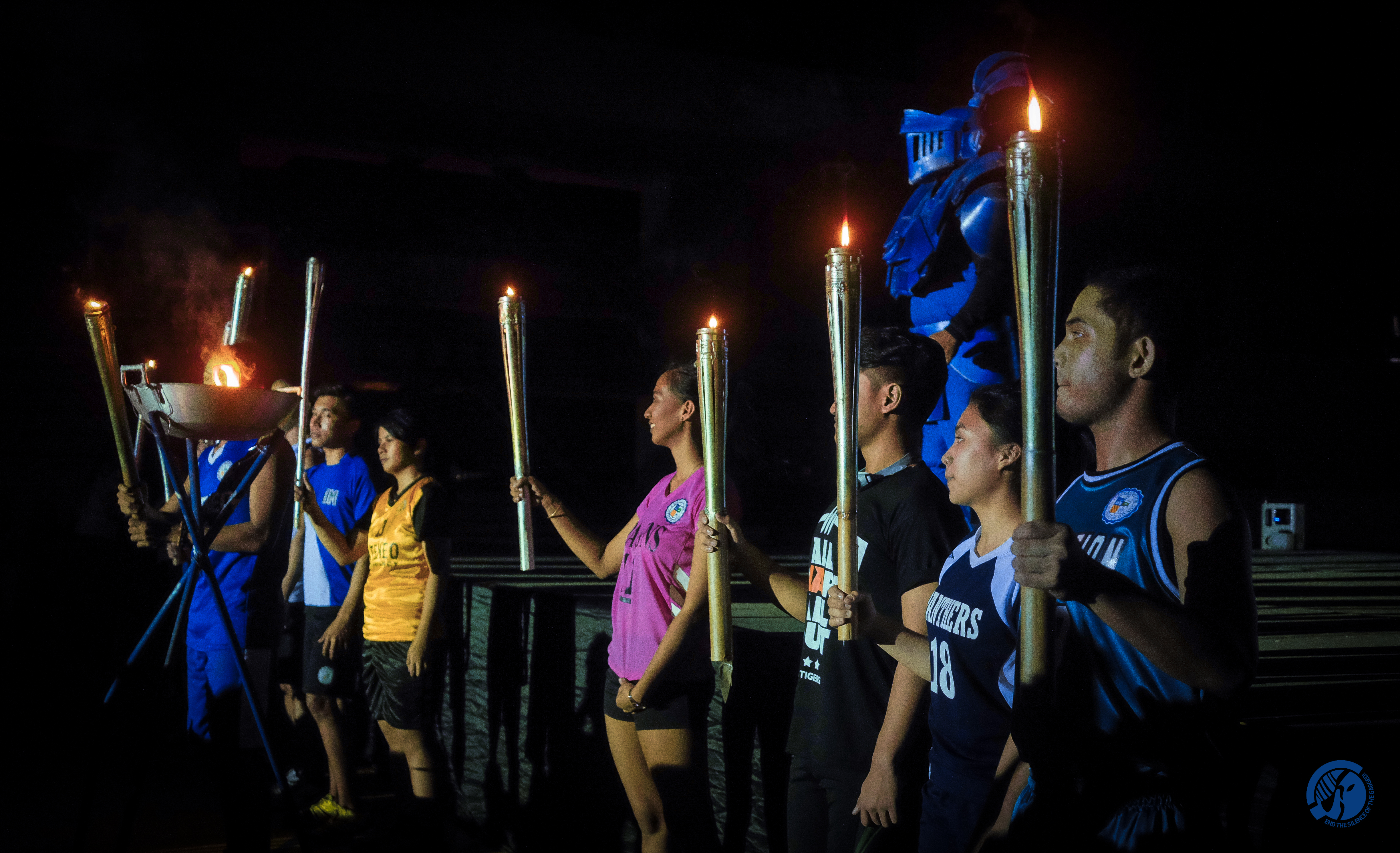 Varsity players from the different sports teams lead the official lighting of the torch. Photo by Alexis Matthew Reyes.