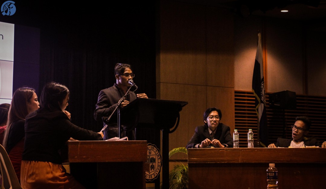 Smith Perez from SEA A giving his speech during the grand finals of the Ignatian Cup debates. Photo by Charlotte Billy Sabanal