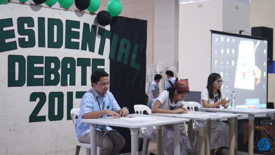 From left to right: Independent candidate John Kevin Espino, BUKLAT Bearer Megue Monteverde, and PIGLASAPAT presidential bet Khryzza Mae Pinzon during the debates. Photo by Christian Dale Espartero